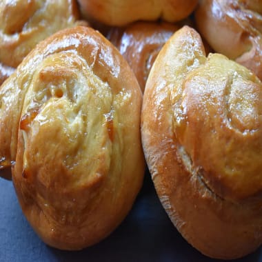 Sticky Marmalade Buns on a black board